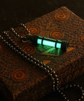 Embrite Glow Fob With Green Embrite Pellet, Aircraft-Grade Aluminum Keychain Accessory displaying ultra bright green glow