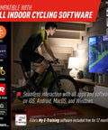 Cyclist using Direto XR-T Direct Drive Bike Trainer with Accurate Power Readings indoors, connected to cycling software on TV.