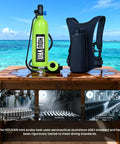 S700 1.9L Mini Scuba Tank DOT Certified Reusable Diving Cylinder Kit on wooden table with ocean background.