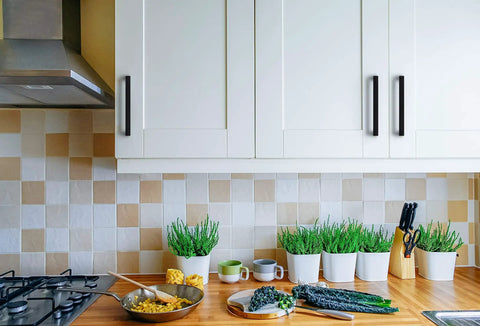 5 Inch Matte Black Cabinet Handles Square Pulls Pack Of 20 For Kitchen Cabinets And Drawers, installed on white cabinets
