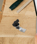 Black T Handle Cam Lock For Cabinets And Boxes Easy To Install And Use, made from ABS and metal, shown on wooden surface.