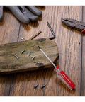 Killer T10 Security Torx Screwdriver With Magnetic Red Handle And Comfort Plastic Grip Crafted From Heavy Duty Chrome Vanadium Steel on wooden surface with screws.