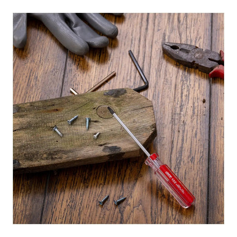 Killer T10 Security Torx Screwdriver With Magnetic Red Handle And Comfort Plastic Grip Crafted From Heavy Duty Chrome Vanadium Steel on wooden surface with screws.