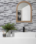 Bathroom view with 10 Sheet Peel And Stick Tile Backsplash In Grey 12x12 Premium Kitchen Tiles featuring a sink and mirror.