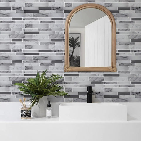 Bathroom view with 10 Sheet Peel And Stick Tile Backsplash In Grey 12x12 Premium Kitchen Tiles featuring a sink and mirror.