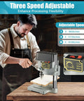 Totally Legit Heavy Duty Mini Bench Drill Press 340W Variable Speed Portable Tool With Rock Solid Cast Iron Base carving holes in wood with adjustable speed settings.