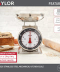 Analog Mechanical Kitchen Scale With Bowl Battery Free And Up To 11 Pounds Measuring In Grams And Ounces For Baking And Cooking Black And Silver For Meal Prep And Everyday Use on countertop with ingredients