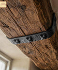Colonial Era Solid Cast Iron Decorative Nailhead Studs For Doors, Cabinets And Furniture installed on rustic wooden beam