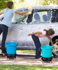 Two Pack Round Plastic Bucket Dollies With Five Quick Spin Swivel Casters For Smooth Easy Rolling. Two women washing a car using mobile bucket dollies.