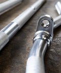 Close-up of Straight Up Heavy Duty Aluminum Curl Bar Attachment Compatible With Cable Machines for home gym fitness.