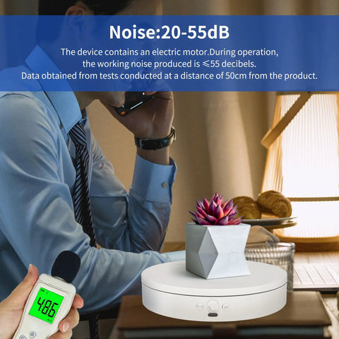 Foxvee 7.87 Inch White Motorized Rotating Display Stand 360 Silent Spinning Turntable with succulent on table.