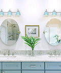 Blue Metal Shade Three Light Vanity Light With Brushed Nickel Finish Over Mirror For Bathroom Bedroom And Hallway, 21.5 Inch Length, installed above double mirrors in bathroom setting, providing warm ambient glow and modern farmhouse vibe.