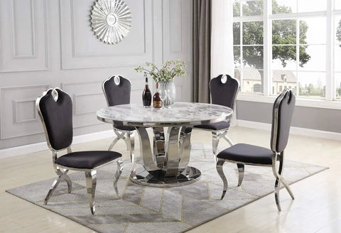 Level Up Your Dining Room With This Top Tier Round White Marble Dining Table Sporting A Sleek Stainless Steel Base And Easy Rotate Lazy Susan For Chill Evening Hangouts, surrounded by black velvet chairs.
