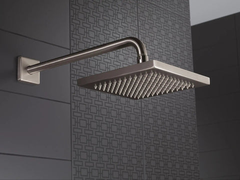 Square shower head with arm, part of the RP46870SS Stainless Tub And Shower Faucet Accessories Kit For Delta Tub And Shower Systems Replacement Parts Durable Brushed Stainless Finish Easy Install Built To Original Specs Quality Tested For Home Reno.