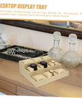 Multi Grid Watch Organizer Tray With Linen Padded Sections showing khaki storage for watches and jewelry on a dresser.