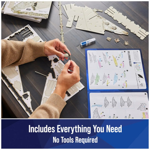 Hands assembling Millennium Falcon 3D Model Kit For Star Wars Fans And Collectors with instructions and parts visible