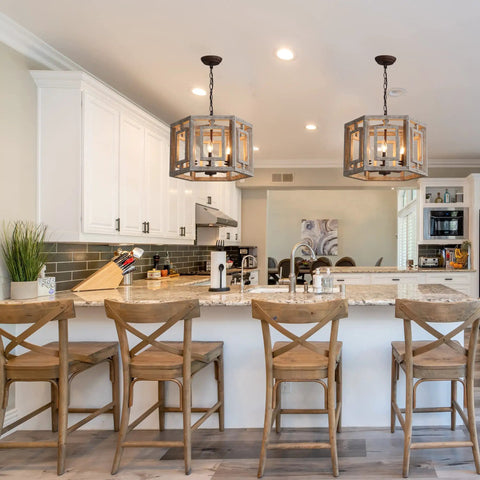 Modern kitchen with Rustic Barn Chic 6 Light Wood Pendant Chandelier With Vintage Cage Design above countertop and wooden chairs.
