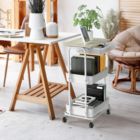 3 Tier Rolling Utility Cart With Drawer And Wood Tabletop Maple Finish in home office setting with books and plant on top