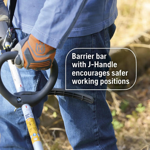 Close-up of 122RJ Gas Powered Brushcutter handle with J-handle grip for safe mowing, worn by person with harness