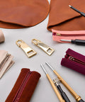Two Pack Gold Zipper Pull Replacement Sliders For Luggage Backpacks Jackets Suitcases And Coats with sewing notions.