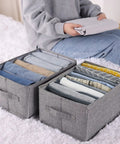 Wardrobe Closet Organizers 4 Piece Set With 7 Grid And 5 Grid Foldable Jeans Organizers for shelf storage bins in use, grey