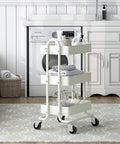Three Tier Metal Rolling Cart With Wheels, Utility Cart On Casters For Office, Home, Kitchen Or Garden, White Finish in laundry room
