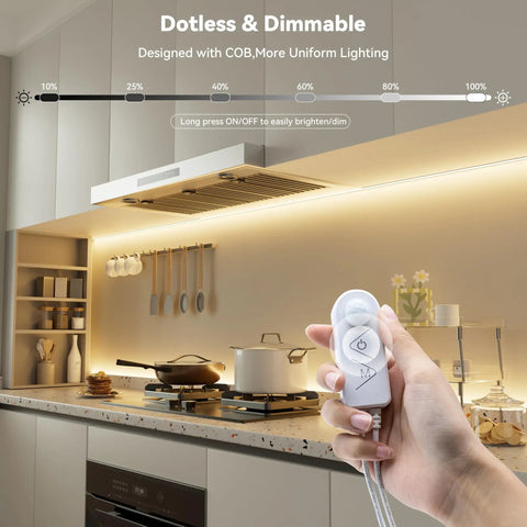 Hand holding Motion Activated LED Dimmer Controller With PIR Sensor in kitchen with LED strip lighting, DC12-24V, 3A Max, 2 Pack