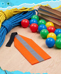 Orange Safety Travel Flag For Kayak And Canoe With Reflective Stripe And Durable Webbing Tow Kit, surrounded by ropes and colorful balls.