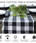 Straight Up Spooky Halloween Table Runner 14X72 Inches Reusable 100 Percent Cotton Fabric on a dining table with greenery.