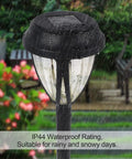 10 Pack Solar Pathway Lights Outdoor Auto On Off Waterproof Garden Landscape Lighting Warm White For Lawn Patio Yard Walkway Deck Driveway No Wiring Now, close-up of black waterproof light in rain