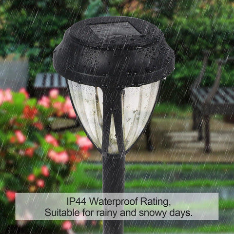10 Pack Solar Pathway Lights Outdoor Auto On Off Waterproof Garden Landscape Lighting Warm White For Lawn Patio Yard Walkway Deck Driveway No Wiring Now, close-up of black waterproof light in rain