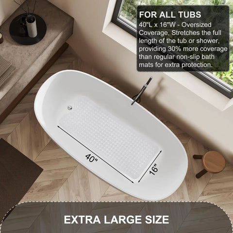Extra Long Non Slip Bathtub Mat, 40 By 16 Inch Machine Washable Shower Mat With Quick Drain Holes And Grippy Suction Cups That Hold Their Ground On Smooth Bathroom Floors, Clear shown in an oversized bathtub.