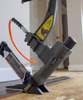 Three In One Pneumatic Flooring Nailer And Stapler For Tongue And Groove Hardwood with mallet and interchangeable base plates in use