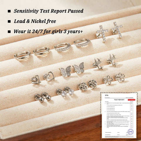 Hypoallergenic Surgical Steel Flat Back Earrings Set For Women And Girls 10 Pairs Of Cute Studs Huggie Hoops And CZ Hoop Staples With Balls Hearts Stars And Flowers Comfy All Day Jewelry Collection silver earrings on fabric display, lead and nickel free