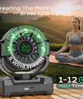 24000mAh Portable Camping Fan With LED Lantern on a table with yoga woman outdoors