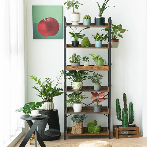 Adjustable Six Tier Open Bookcase With Mid Century Rustic Farmhouse Charm And Industrial Wood And Black Metal Build holding plants in living room.