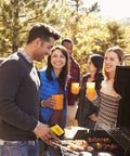 Person using Beast Dual Laser Non-Contact Infrared Thermometer for Surface Temperature during a BBQ gathering with friends