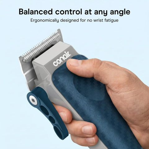 Hand holding Rechargeable Hair Clippers Kit With Color Coded Guide Combs 17 Pieces For Barber Quality Cuts No Pulling Or Snagging
