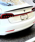 Mean Looking Sequential Led Tail Lights And Trunk Light Bar For Tesla Model 3 And Y Gen Two view showing sleek design and brightness.