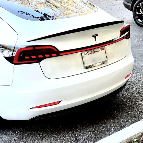 Mean Looking Sequential Led Tail Lights And Trunk Light Bar For Tesla Model 3 And Y Gen Two view showing sleek design and brightness.