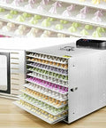Built Different Commercial Food Dehydrator With 10 Layer Stainless Steel Professional Electric Dryer Machine showcasing colorful snacks.