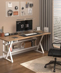 Modern home office setup with desk and chair, featuring a computer monitor, keyboard, and organized stationery on a wooden surface.