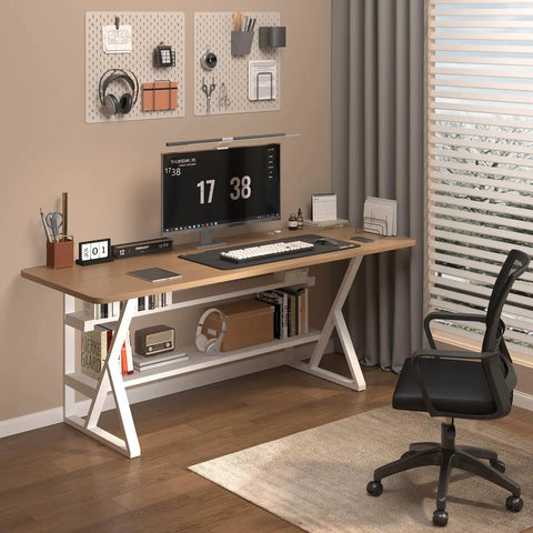 Modern home office setup with desk and chair, featuring a computer monitor, keyboard, and organized stationery on a wooden surface.