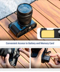 Street Ready S9 Hand Grip For Panasonic Lumix S9 Camera With L Shape Bracket And Built In Arca Quick Release Plate Battery Compartment Access Anti Slip Leather Pad For A Solid On The Go Shoot showing battery access and handling.