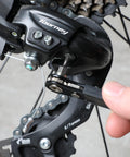 Using Tamper Proof Torx Bit Set With Mini Ratchet Wrench on bicycle derailleur for precision fastening