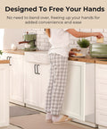 Person using Under Cabinet Foot Pull Hands Free Trash Drawer Opener With Adhesive Strips And Screws White in kitchen