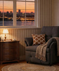 Dark grey power recliner chair with heat and massage, linen electric recliner sofa with remote, in cozy living room corner, sunset view.