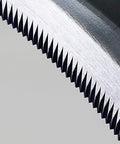 Close-up of serrated edge on Go-To 6.7 Inch Japanese Serrated Garden Sickle With Razor Sharp Carbon Steel Blade For Harvesting And Weeding