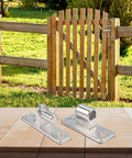 heavy duty stainless steel gate hinges in front of wooden gate