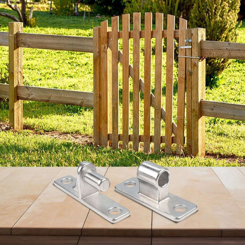heavy duty stainless steel gate hinges in front of wooden gate